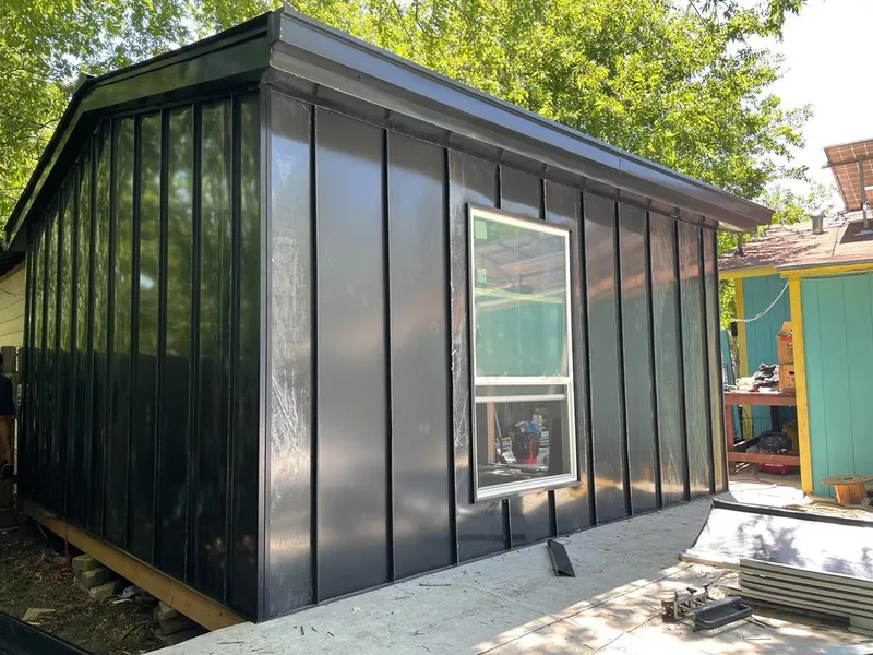 Black standing seam metal wall panels for Roof Inspection in Madera Ranchos