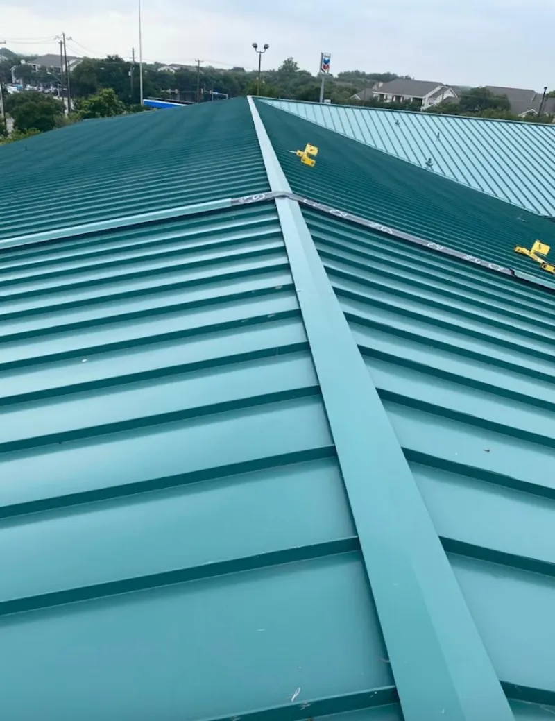 Green commercial metal roof ridge and valley for Metal Roof Repair in Madera Ranchos